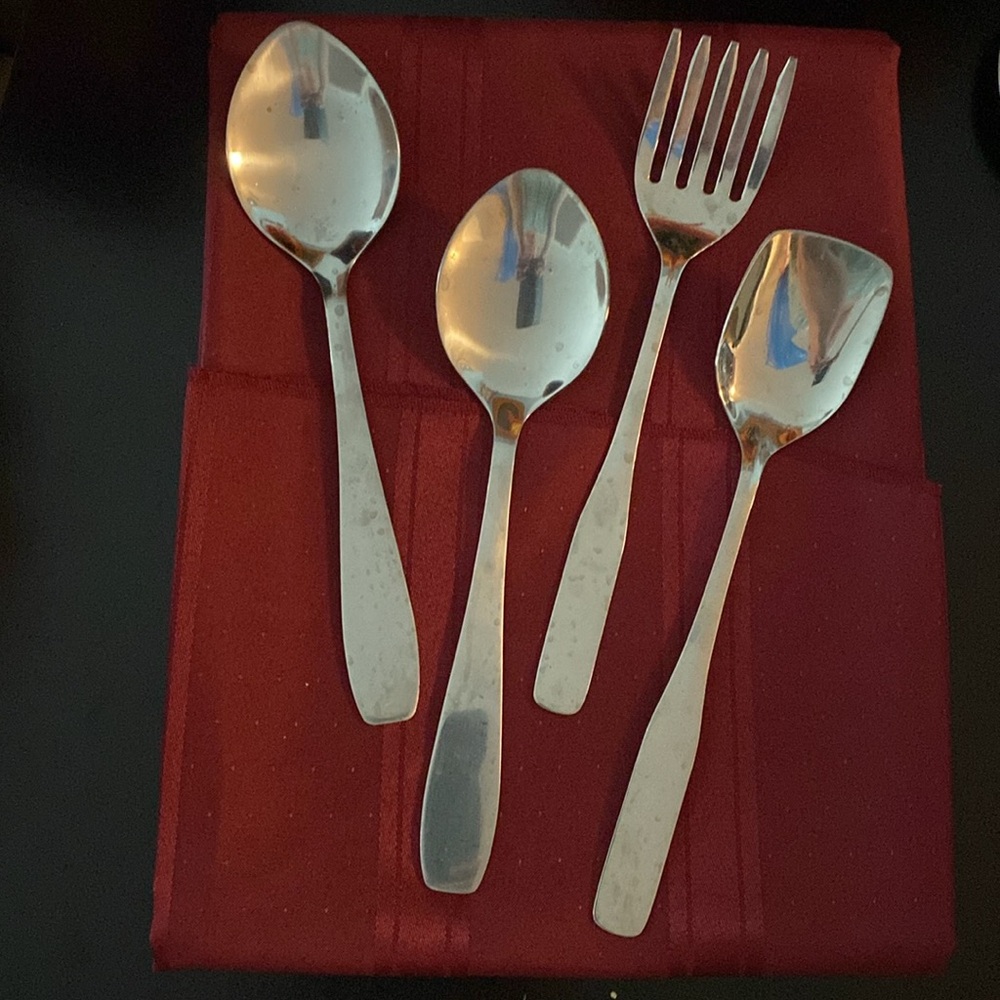 Set of four stainless steel serving utensils